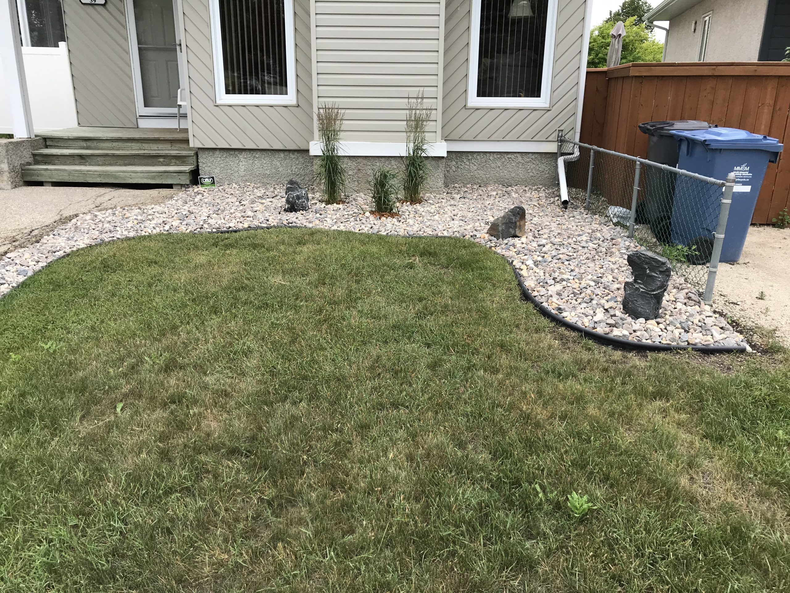 Professional rock landscaping work by D&J Yardworks